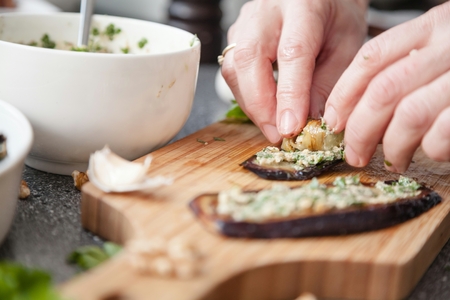 Tasty eggplant rolls stuffed with cottage cheese.