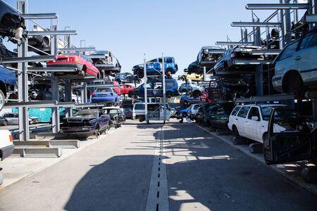 Recycling of old,used, wrecked cars. Dismantling for parts at scrap yards and sending for remeltingの写真素材