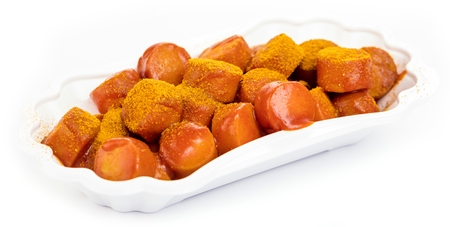 Traditional German currywurst isolated on white background.の写真素材
