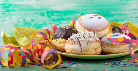 German donuts - krapfen or berliner - filled with jam for carnivalの写真素材