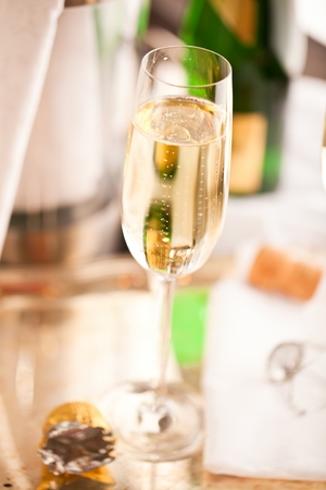 champagne glasses and bottle on dark backgroundの写真素材