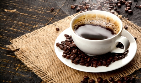 Cup of hot coffee drink with coffee beam's