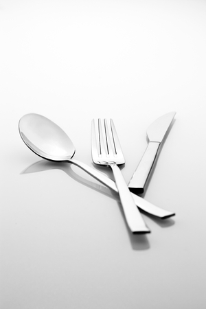 Set of cutlery spoon fork and knife stainless steel isolated on white backgroundの写真素材