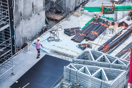 Construction workers fabricating steel reinforcement bar at the construction siteの写真素材
