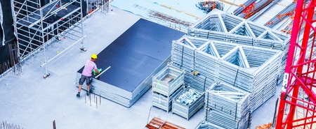 Construction workers fabricating steel reinforcement bar at the construction site