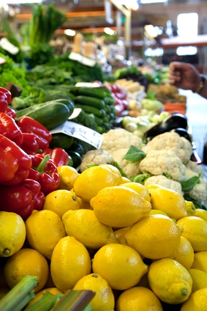 Fruit market with various colorful fresh fruits and vegetablesの写真素材
