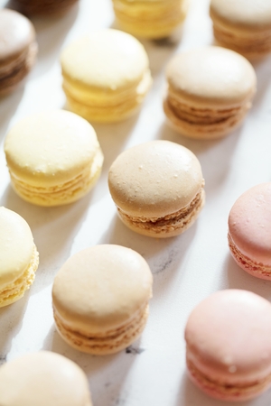 French macaroon cake. Macaroons on white backgroundの写真素材