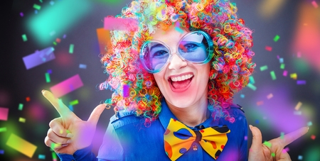 Portrait of beautiful party woman in wig and glasses Carnivalの写真素材