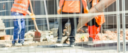 Workers on a road construction, industry and teamworkの写真素材