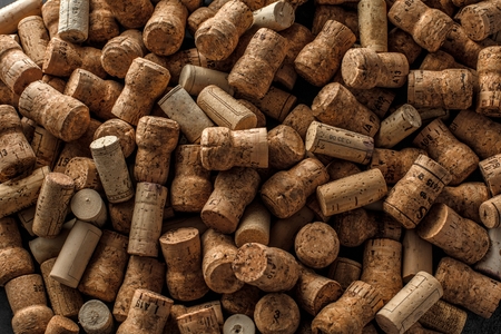 Wine corks background red wine glass and wine corks