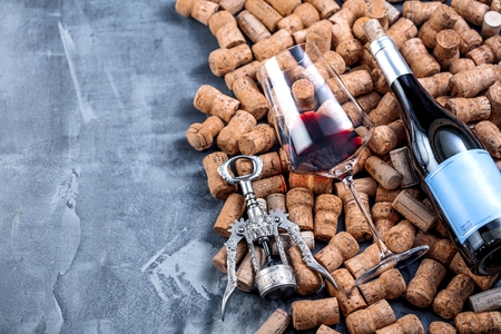 Wine corks background red wine glass and wine corksの写真素材
