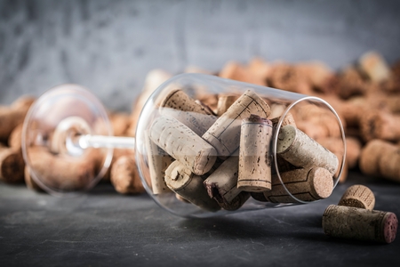 Wine corks background red wine glass and wine corksの写真素材