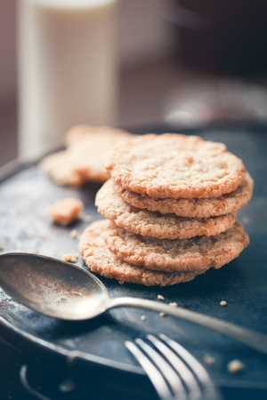 Group of homemade oats cookies closeup on a dish.