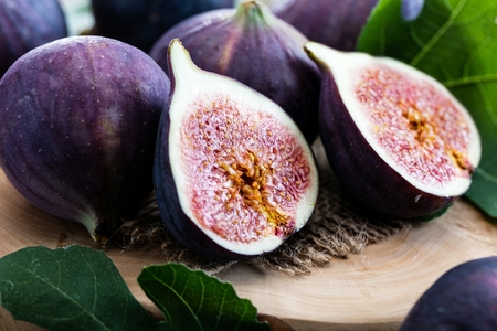 Fresh figs on rustic vintage wooden tableの写真素材