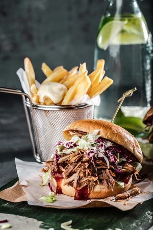 homemade pulled pork burger with bbq sauce close upの写真素材