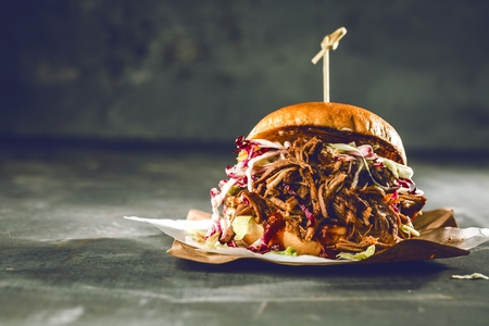 homemade pulled pork burger with bbq sauce close upの写真素材