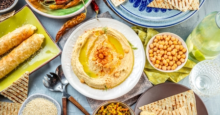 Healthy Homemade Creamy Hummus with Olive Oil and Pitaの写真素材