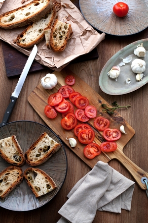 Italian cooking concept. Bruschettas with pesto, tomatoesの写真素材