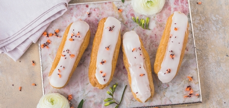 Home made cake eclairs. Traditional eclairs, profitroles classic, eclairs french.