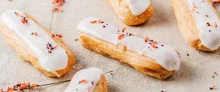 Home made cake eclairs. Traditional eclairs, profitroles classic, eclairs french.