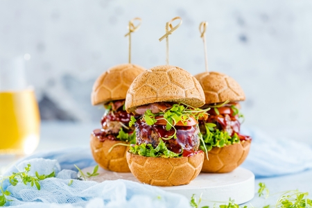 fresh delicious burgers in Form of Football soccer.の写真素材