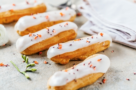 Home made cake eclairs. Traditional eclairs, profitroles classic, eclairs french.の写真素材