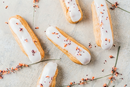 Home made cake eclairs. Traditional eclairs, profitroles classic, eclairs french.の写真素材