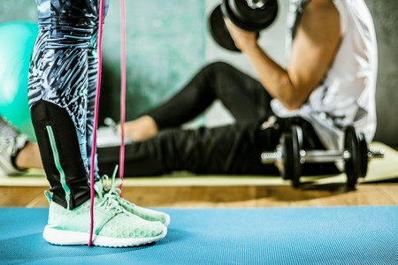 Body and mind workout in loft fitness studio.
