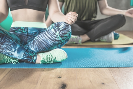 Body and mind workout in loft fitness studio.の写真素材