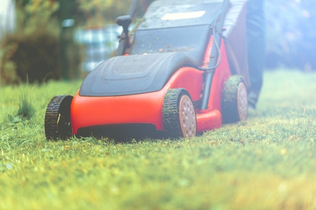 Lawn mower mower grass equipment mowing gardener care work tool.の写真素材