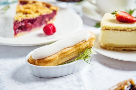 Homemade cheesecake with fresh raspberries and mint for dessert - healthy organic summer dessert pie...