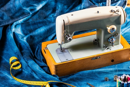 sewing indigo denim jeans with sewing machine, garment industrial conceptの写真素材