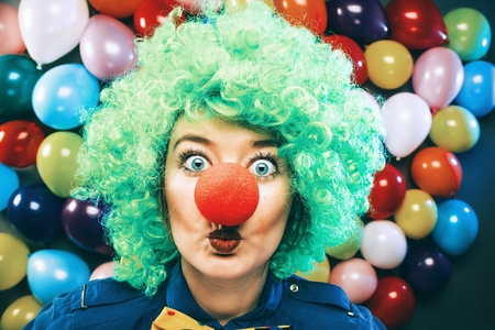 Portrait of beautiful party woman in wig and glasses Carnevalの写真素材