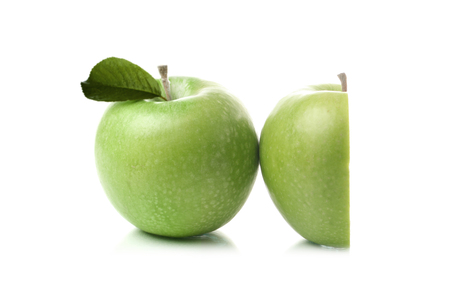 Green apple pyramid. Ripe green apples isolated on white backgroundの写真素材