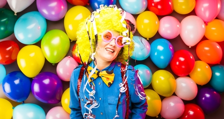 Portrait of beautiful party woman in wig and glasses Carnevalの写真素材