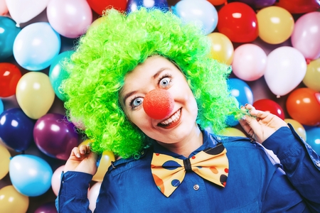 Portrait of beautiful party woman in wig and glasses Carnevalの写真素材