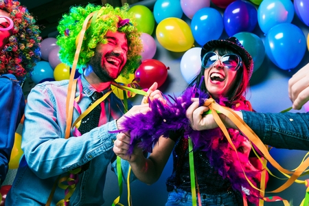 Party People celebrating carnival or New Year in party clubの写真素材