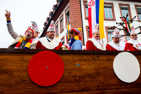 Line of people on a float the Rose Monday parade in Mainz, Germany.のeditorial素材
