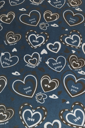 Old blue recycled paper with hearts and the word love.の写真素材