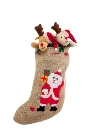 Christmas stocking with Santa Claus, isolated on white の写真素材