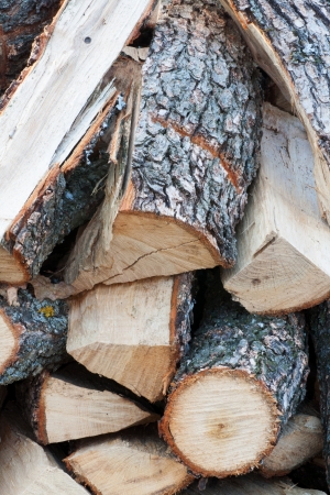 Pile of wooden logs stacked for firewood  Close up の写真素材