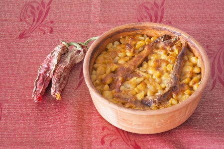 Traditional Macedonian food Tavce Gravce on clay panの写真素材