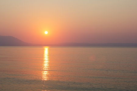 Beautiful sunset in Aegean sea  Sunrise at Strimonikos gulf, New Vrasna, Greeceの写真素材