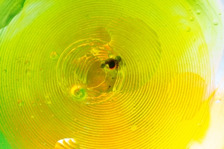 Abstract background. Composition, liquid, circles and bubbles on a colorful backgroundの写真素材