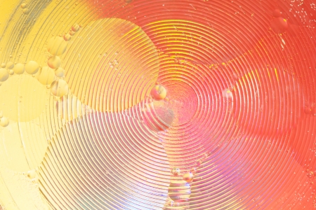 Abstract background. Composition, liquid, circles and bubbles on a colorful backgroundの写真素材