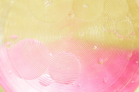 Abstract background. Composition, liquid, circles and bubbles on a colorful backgroundの写真素材