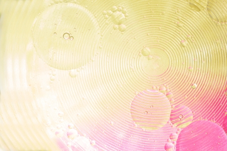 Abstract background. Composition, liquid, circles and bubbles on a colorful backgroundの写真素材