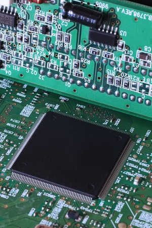 Electronic circuit board close up. Computer hardware background.