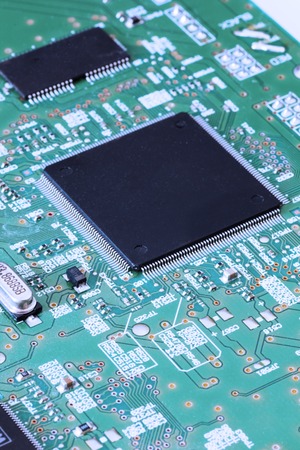 Close up of electronic circuit board with processor.