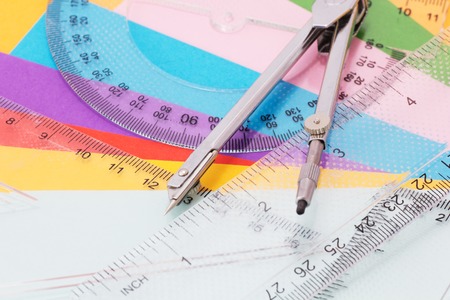 Tools for Measurement, Drawing and Scale. Paper in More Colors in the Background.の写真素材